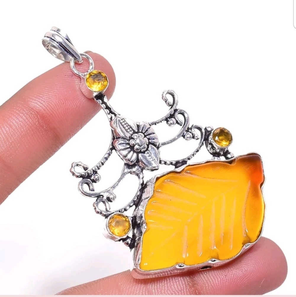Handcrafted Carved Yellow Onix pendant
